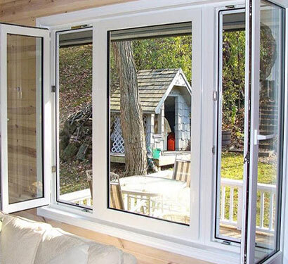 White aluminum casement windows open into a residential room