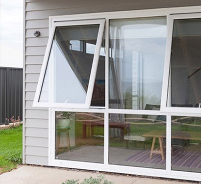 white-picture-window-with-aluminum-awning-window